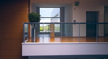 balcony of commercial office building with view from second floor window