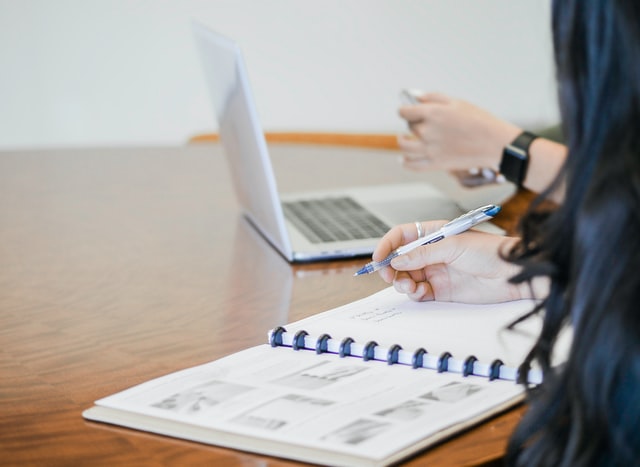People calculating real estate return on investment